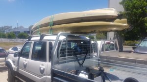 Hobie kayaks double stacked on the roof